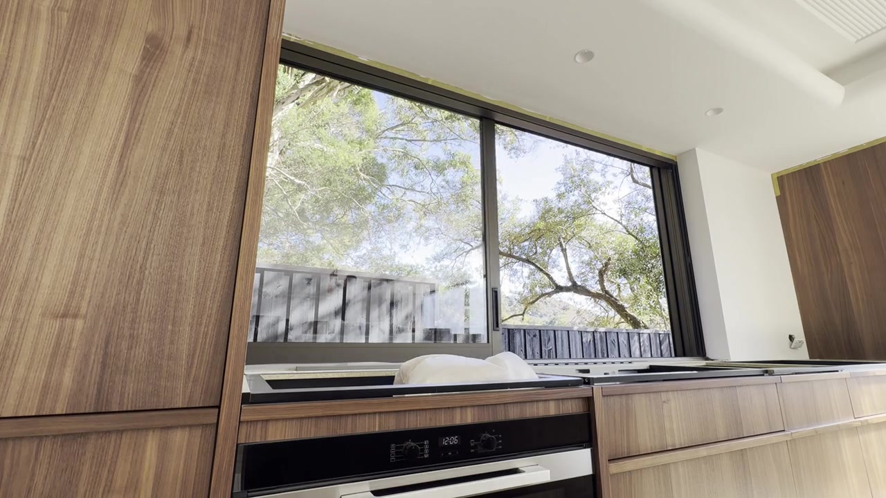 Automated sliding kitchen window at Bayview